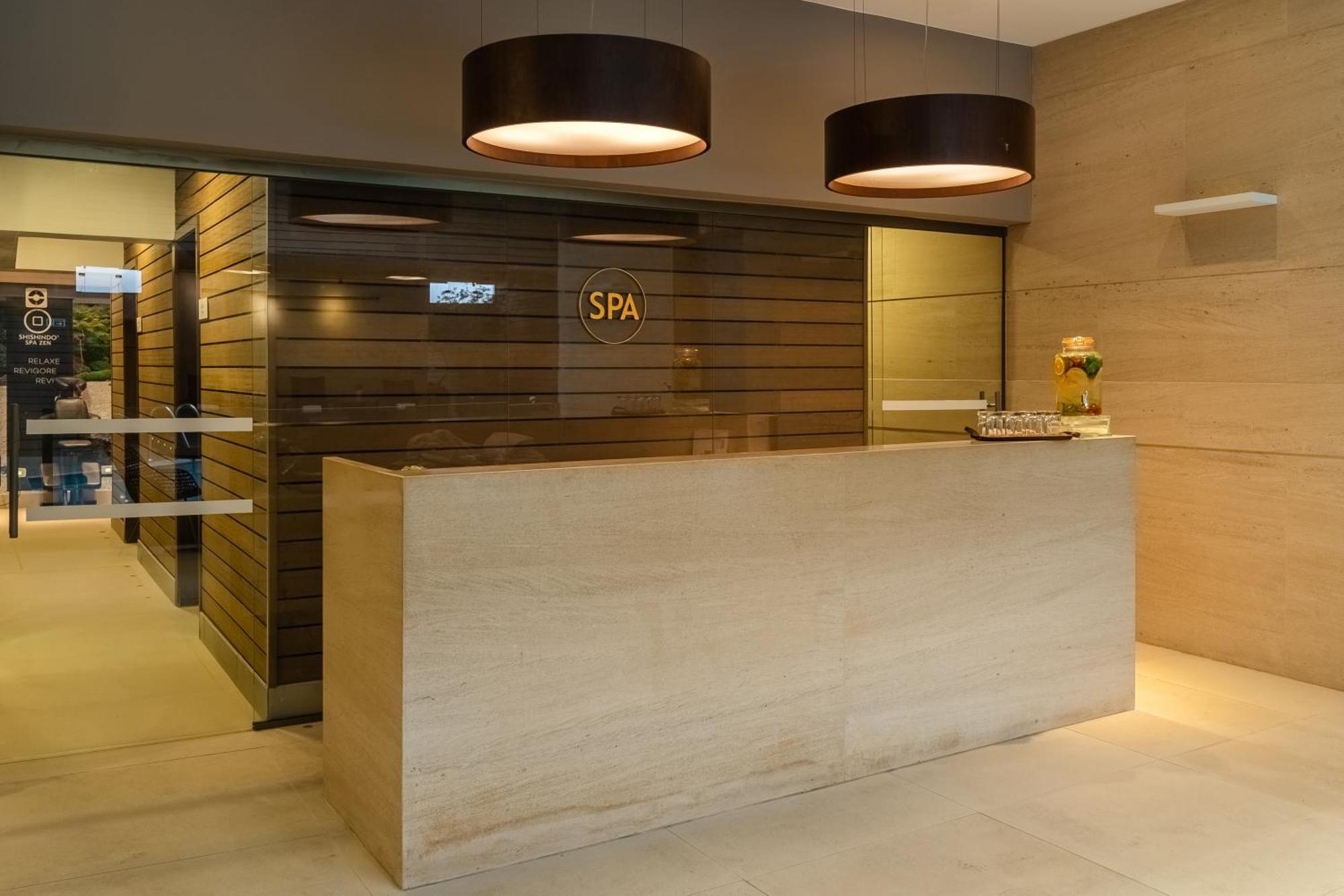 Bourbon Hotel & Suites Curitiba Eksteriør bilde Spa reception desk